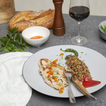 Filete de ternera lechal tapa acompañado de quinoa y pimientos del piquillo.